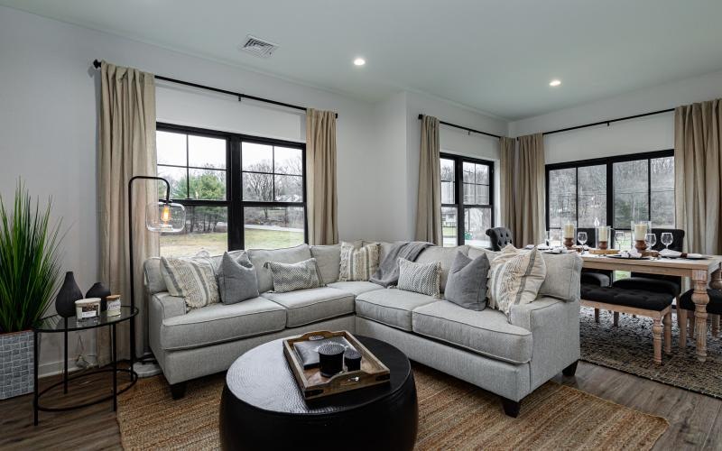 a living room with a couch and a coffee table