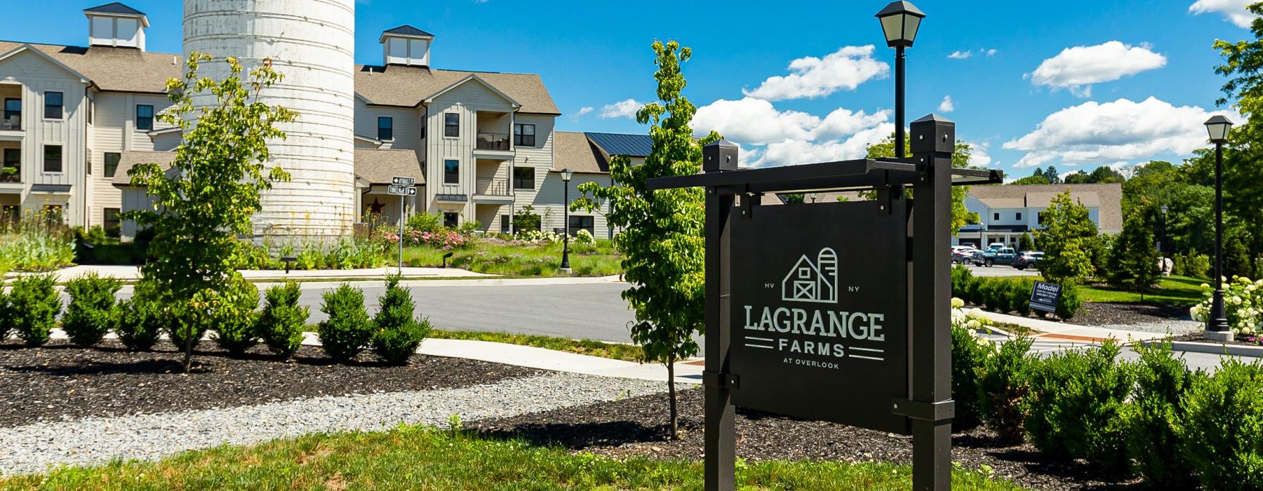 a sign in front of a building